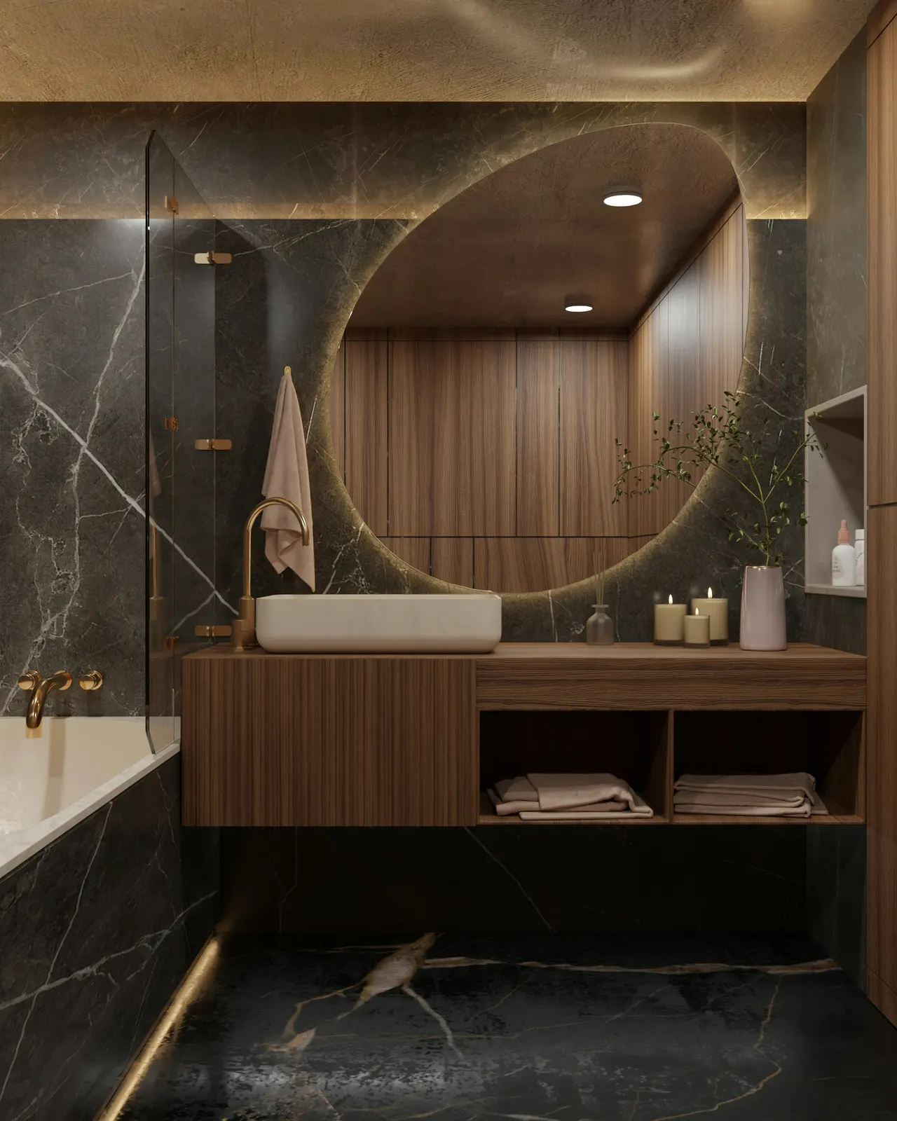 A dark marble bathroom with a wood vanity under a round backlit mirror.